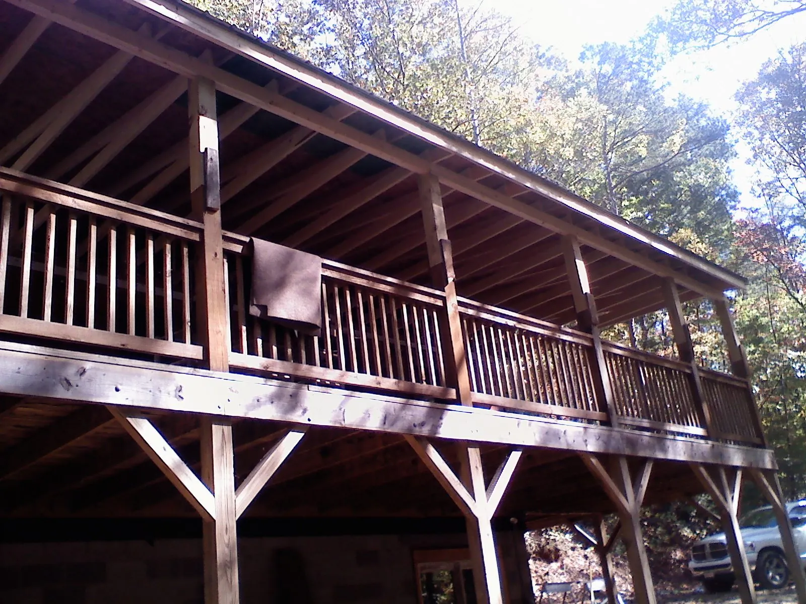 Timber framing under a new elevated porch and deck — Roof Leak Repair in Munford by Roofing Brothers
